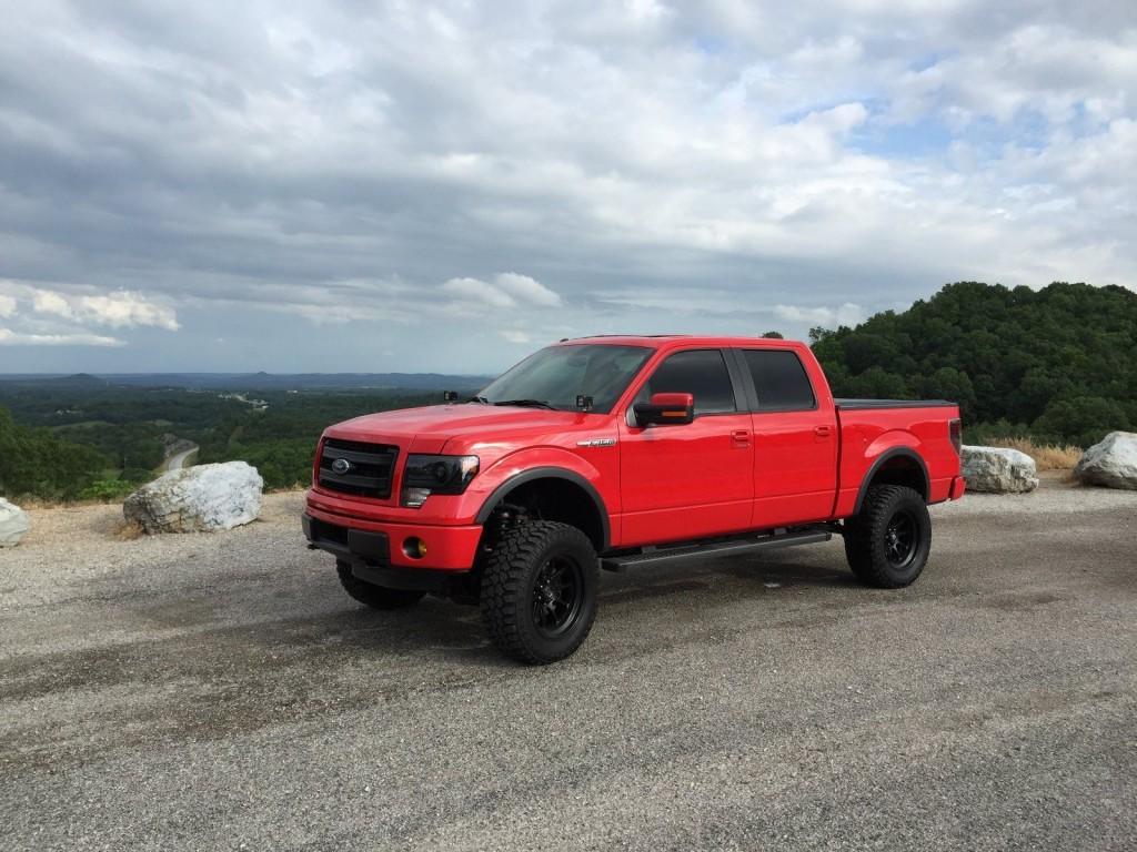 2014 Ford F150 FX4 Super Crew 5’5 Red Lifted 5.0