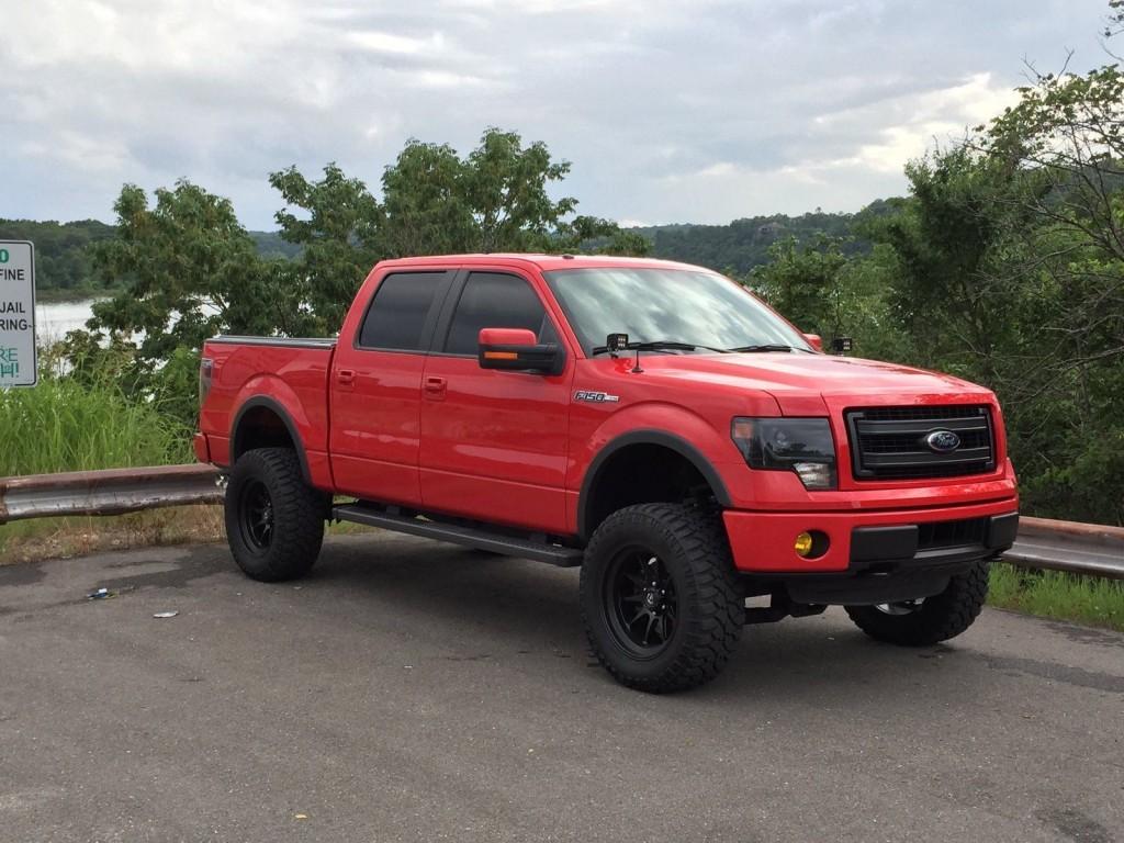 2014 Ford F150 FX4 Super Crew 5’5 Red Lifted 5.0