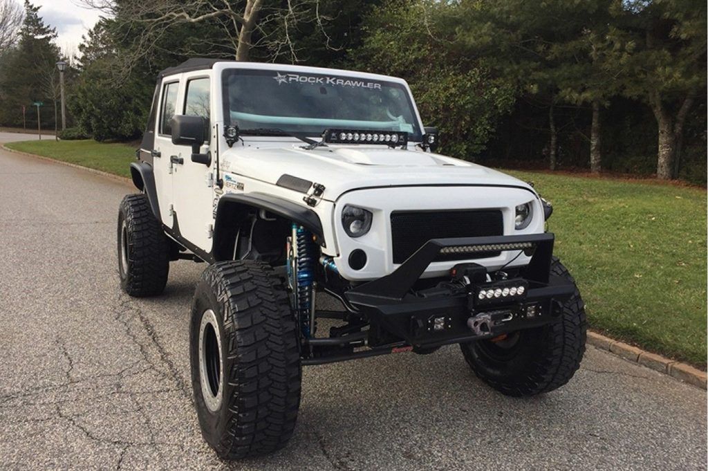 low miles 2013 Jeep Wrangler Freedom Edition monster