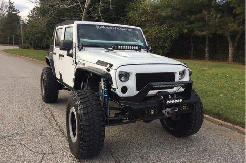 low miles 2013 Jeep Wrangler Freedom Edition monster for sale