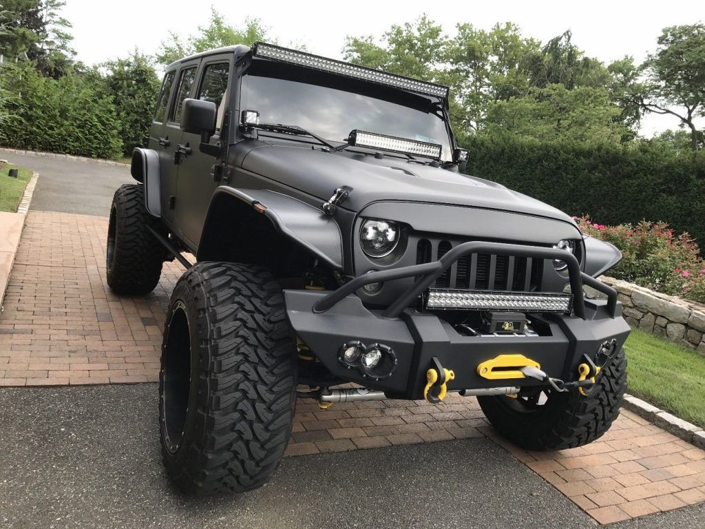 highly customized 2014 Jeep Wrangler Sport monster