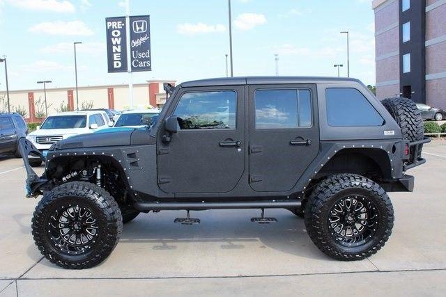 low miles 2014 Jeep Wrangler Unlimited Sport monster truck