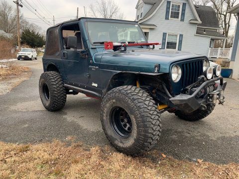well modified 1998 Jeep Wrangler Sport monster for sale